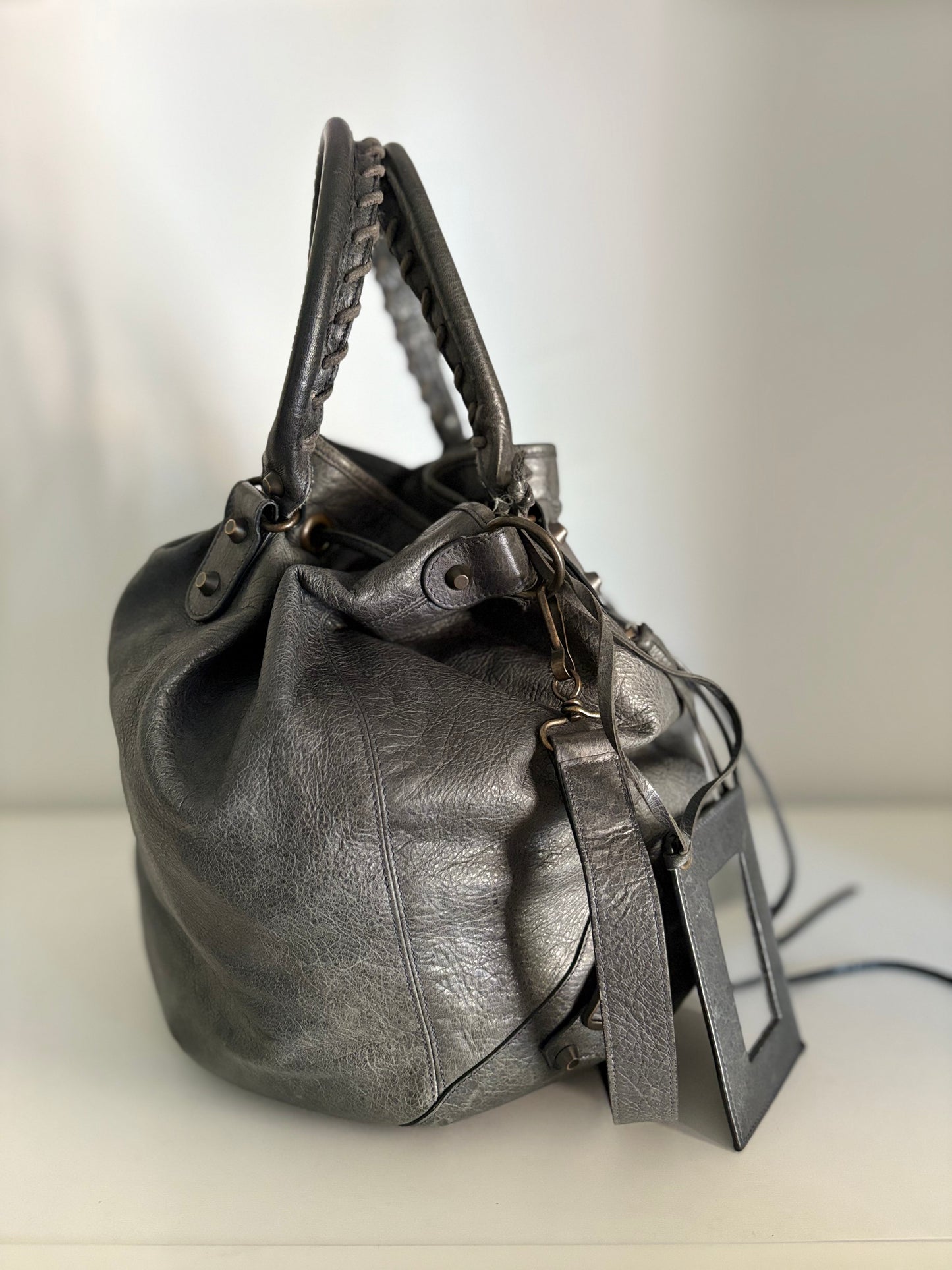 Balenciaga pompon bucket bag