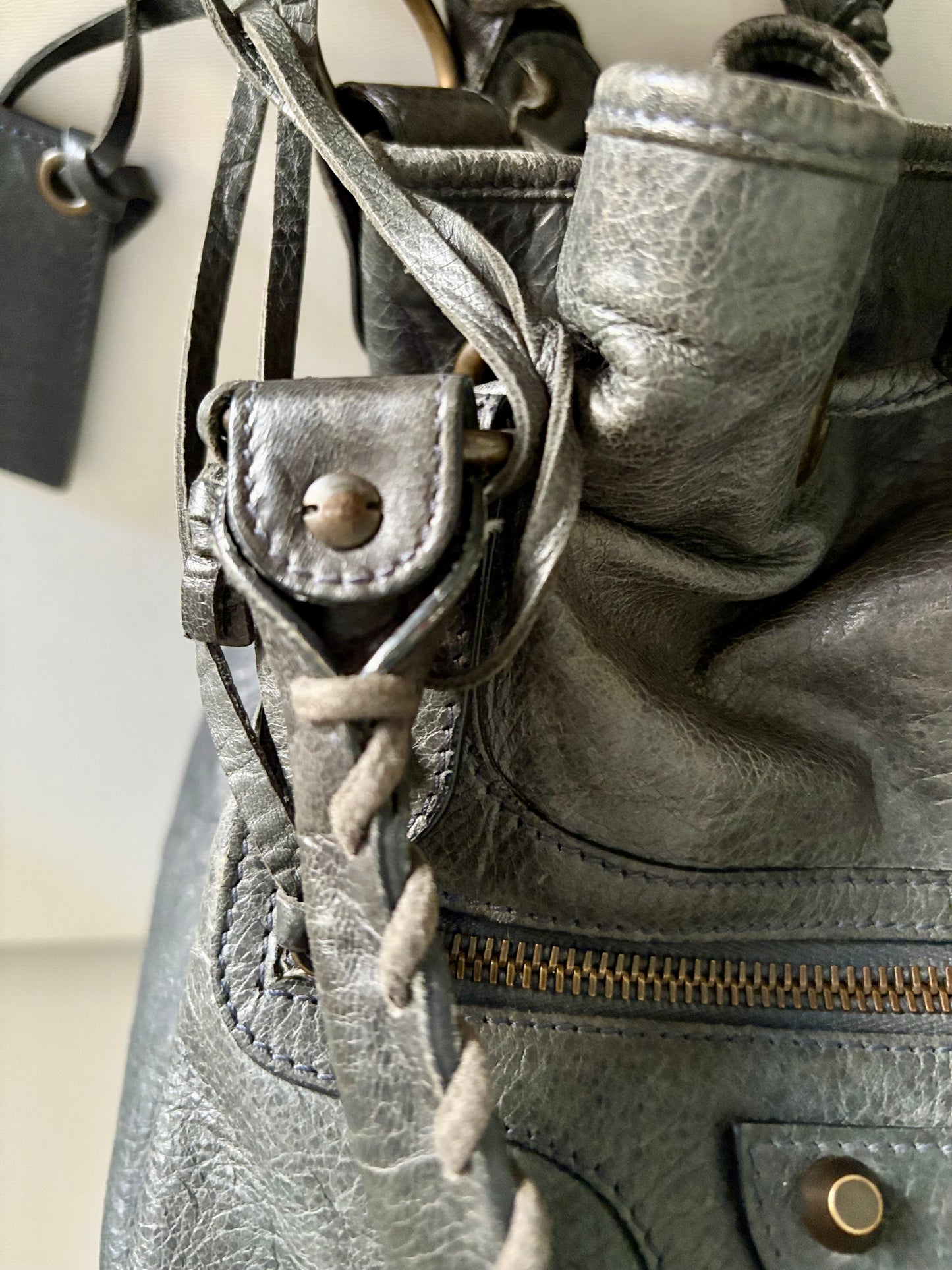 Balenciaga pompon bucket bag