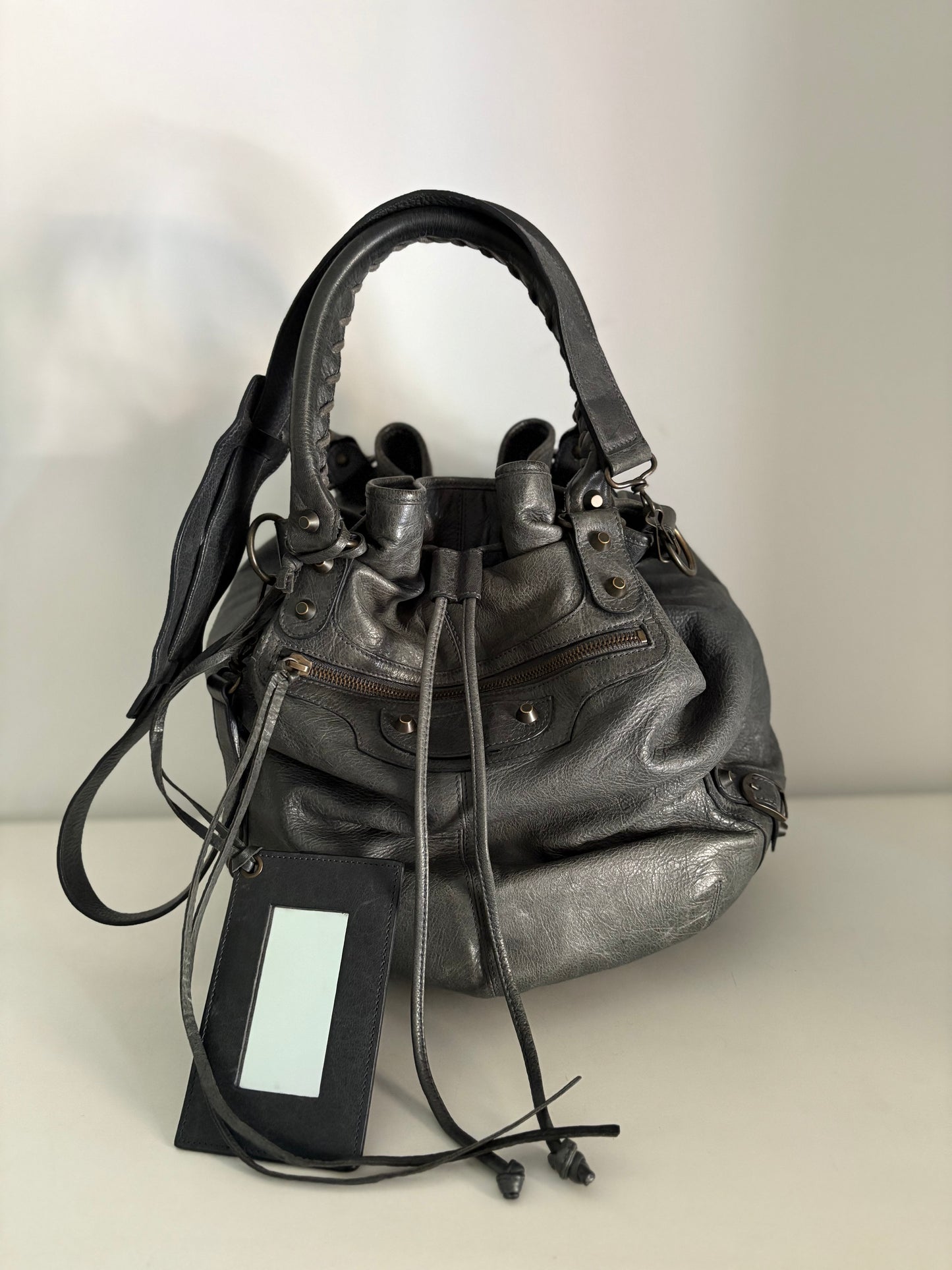 Balenciaga pompon bucket bag