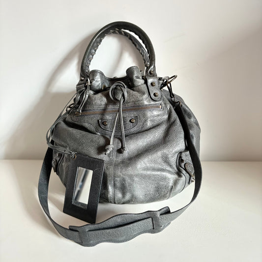 Iconic  Balenciaga pompon bucket bag